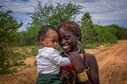Grandson Adam meeting Hamar girl, Southern Ethiopia null